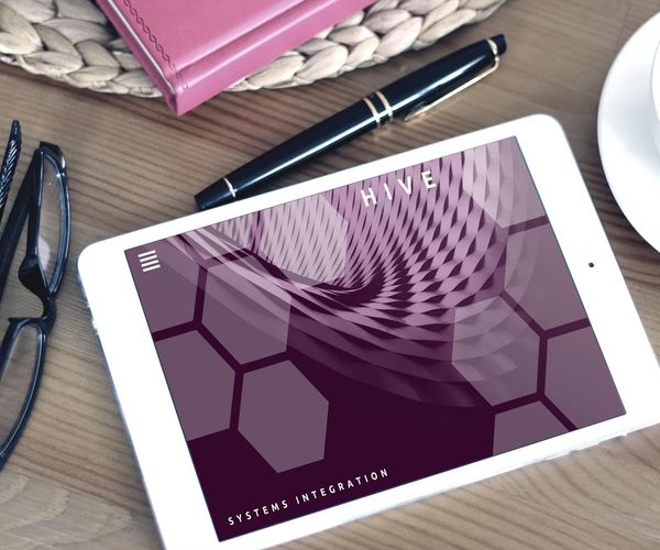 Person integrating a wellness routine at a modern, clean workspace.